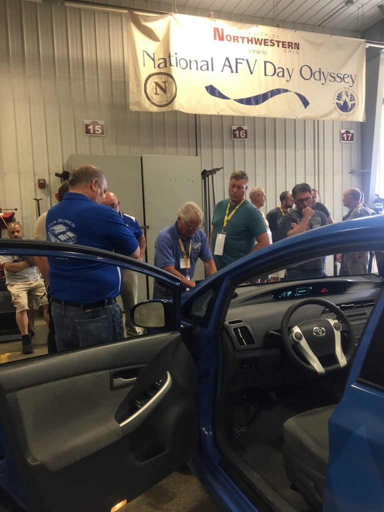 NAFTC Trainer and Class Participants Inspect Electric Vehicle